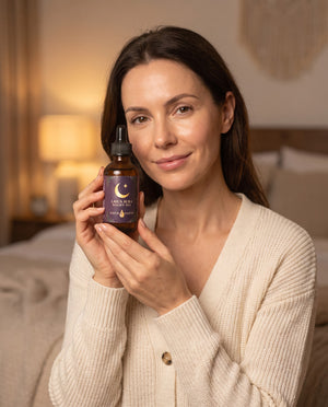 Woman applying Laila Aura night oil as the last step of her evening
